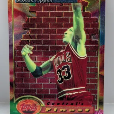 Sale Photo Thumbnail #467: 1993-94 Topps Finest Scottie Pippen #102 basketball trading card featuring a refractory metallic finish and brick wall background.