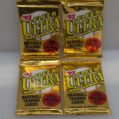 Sale Photo Thumbnail #450: Four unopened foil packs of 1992 Fleer Ultra Series 1 baseball trading cards, each containing 14 cards.