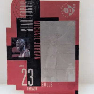 Sale Photo Thumbnail #916: 1997-98 Upper Deck UD3 Star Focus Michael Jordan die-cut insert basketball card.