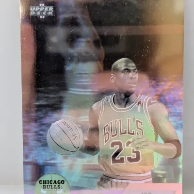 Sale Photo Thumbnail #880: 1992-93 Upper Deck Michael Jordan MVP hologram basketball card #23 in raw condition.