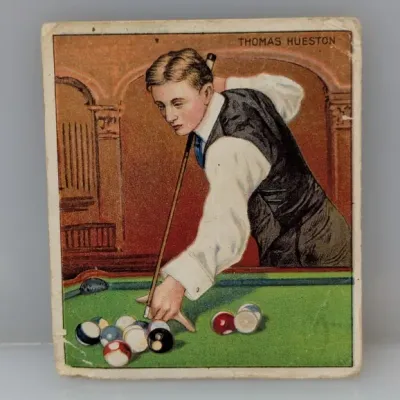 Sale Photo Thumbnail #373: Vintage Mecca Cigarettes T218 pocket billiards trading card featuring Thomas Hueston, circa 1910. The card exhibits light edge wear and corner rounding consistent with age.