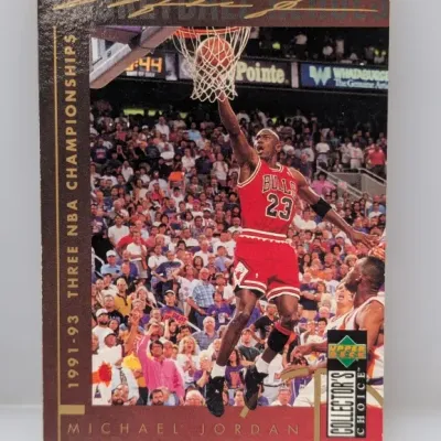 Sale Photo Thumbnail #874: 1993-94 Upper Deck Collector's Choice Michael Jordan basketball card, featuring the 1991-93 Three NBA Championships subset.