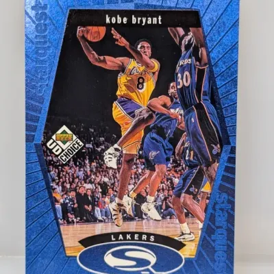 Sale Photo Thumbnail #407: 1998-99 Upper Deck Choice StarQuest Kobe Bryant basketball card #SQ1 featuring a blue foil texture border.