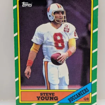 Sale Photo Thumbnail #603: 1986 Topps Steve Young rookie football card, #374, featuring the quarterback in his Tampa Bay Buccaneers uniform.