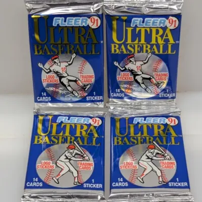Sale Photo Thumbnail #480: Four unopened wax packs of 1991 Fleer Ultra Baseball trading cards and logo stickers.