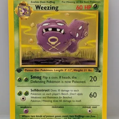 Sale Photo Thumbnail #492: 1st Edition Weezing Pokémon trading card from the 1999 Fossil set (#45/62), illustrated by Mitsuhiro Arita.