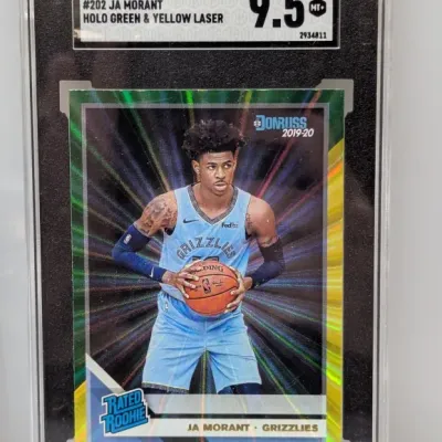 Sale Photo Thumbnail #99: SGC-graded 9.5 Mint+ 2019-20 Donruss #202 Ja Morant Holo Green & Yellow Laser Rated Rookie basketball card.