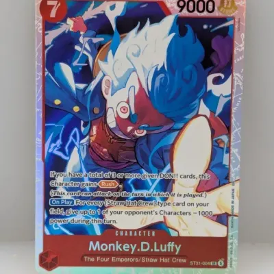 Sale Photo Thumbnail #832: One Piece Card Game Monkey.D.Luffy Super Rare alternate art trading card (ST21-004 SR). It features stylized character artwork with holographic borders.