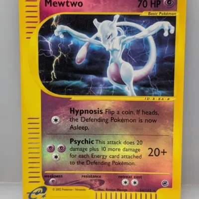 Sale Photo Thumbnail #72: 2002 Pokémon Expedition Base Set holographic Mewtwo trading card (#56/165), featuring artwork by Kimiya Masago.