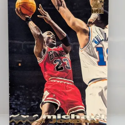 Sale Photo Thumbnail #932: 1993-94 Topps Stadium Club Michael Jordan #1 basketball trading card featuring foil lettering.