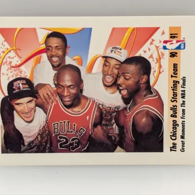 Sale Photo Thumbnail #521: 1991-92 Upper Deck trading card featuring The Chicago Bulls Starting Team celebrating their 1990-91 NBA Finals championship victory.