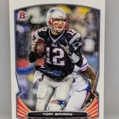 Sale Photo Thumbnail #215: Tom Brady Bowman football trading card, featuring him in his New England Patriots uniform.