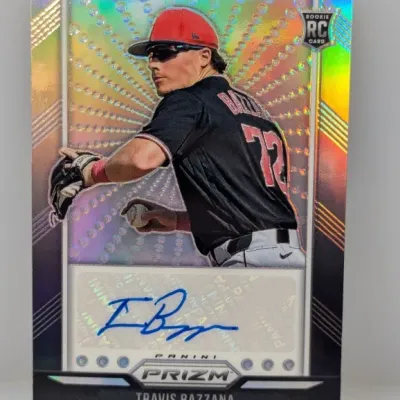 Sale Photo Thumbnail #237: Panini Prizm Travis Bazzana rookie card with an on-card autograph in blue ink. Features a holographic prizm finish and Cleveland logo branding.
