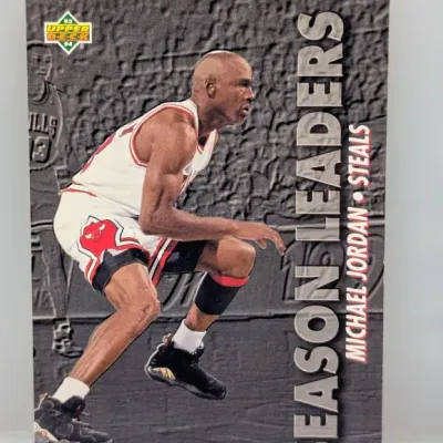 Sale Photo Thumbnail #839: 1993-94 Upper Deck Season Leaders Michael Jordan trading card (#165) featuring him in his Chicago Bulls uniform.