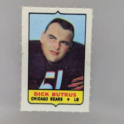 Sale Photo Thumbnail #229: 1969 Topps Football stamp featuring Dick Butkus of the Chicago Bears, in vintage condition with perforated edges.
