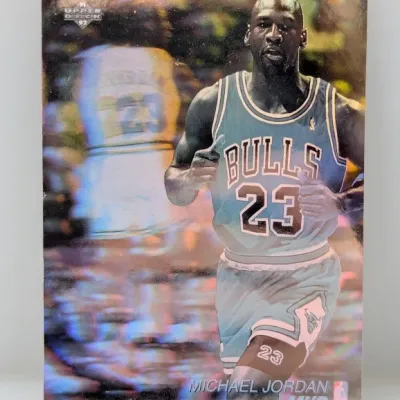 Sale Photo Thumbnail #882: 1991-92 Upper Deck Michael Jordan MVP hologram basketball card (#AW1), featuring a holographic action image of Jordan in his Chicago Bulls uniform.