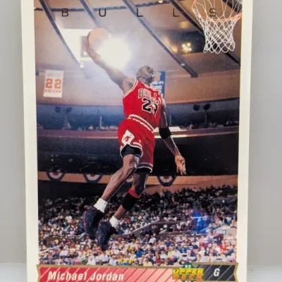 Sale Photo Thumbnail #895: 1992-93 Upper Deck Michael Jordan basketball trading card #23, featuring an action shot in his Chicago Bulls uniform.