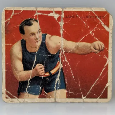 Sale Photo Thumbnail #389: Vintage James J. Jeffries boxing trading card featuring heavy creasing and edge wear throughout.