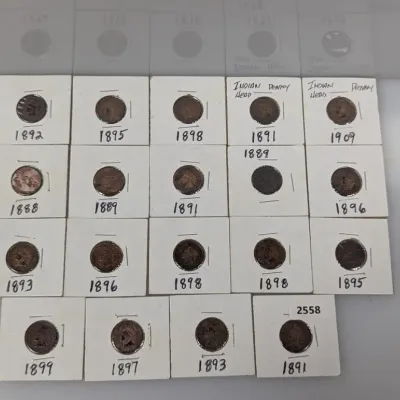 Sale Photo Thumbnail #1049: Collection of nineteen US Indian Head cents in cardboard flips, dated from 1888 to 1909.