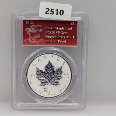 Sale Photo Thumbnail #1001: 2012 Canadian $5 Silver Maple Leaf Reverse Proof coin with Dragon Privy Mark, graded PCGS SP Gem and encapsulated in a protective slab.