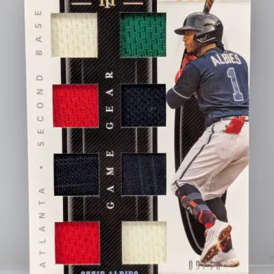 Sale Photo Thumbnail #379: Panini National Treasures Ozzie Albies "Game Gear" multi-relic baseball card, serial numbered 09/10.