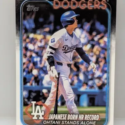 Sale Photo Thumbnail #871: 2024 Topps baseball trading card featuring Shohei Ohtani of the Los Angeles Dodgers, titled "Japanese Born HR Record / Ohtani Stands Alone," in near-mint condition.