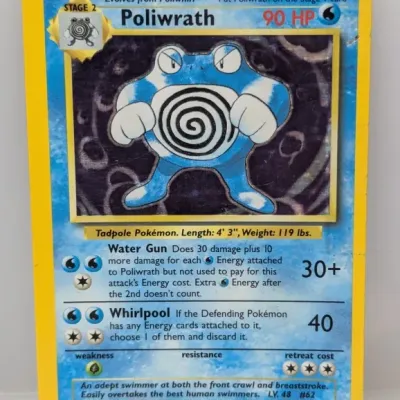 Sale Photo Thumbnail #122: 1999 Pokémon Base Set Poliwrath holographic trading card, number 13/102.