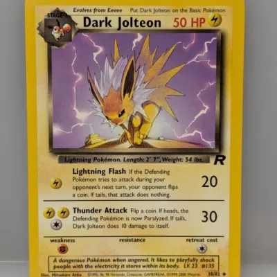 Sale Photo Thumbnail #834: Pokémon Dark Jolteon card from the Team Rocket expansion, numbered 38/82 and illustrated by Mitsuhiro Arita, 1999–2000 Wizards of the Coast.