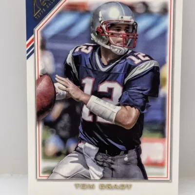 Sale Photo Thumbnail #918: Topps Gallery Tom Brady trading card in excellent condition, featuring him in his New England Patriots jersey.