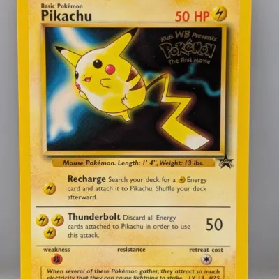 Sale Photo Thumbnail #574: 1999 Pokémon Black Star Promo #4 Pikachu card, featuring Kids WB Presents 'The First Movie' gold foil stamp.