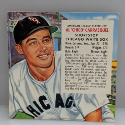 Sale Photo Thumbnail #537:  Vintage 1954 Topps Al 'Chico' Carrasquel #19 Chicago White Sox baseball card depicting a portrait illustration and player bio.