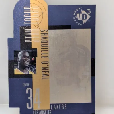 Sale Photo Thumbnail #423: Upper Deck UD3 Star Focus die-cut basketball card featuring Shaquille O'Neal of the Los Angeles Lakers, late 1990s.