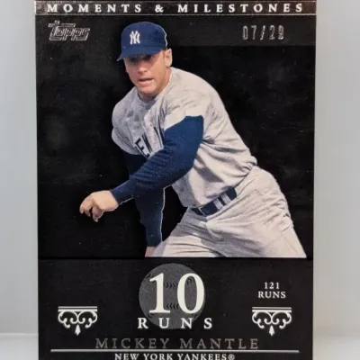 Sale Photo Thumbnail #364: Topps Moments & Milestones Mickey Mantle baseball card, serial-numbered 07/29, featuring black border design.