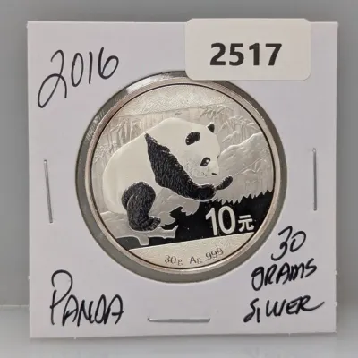 Sale Photo Thumbnail #1008: 2016 Chinese Silver Panda 10 Yuan coin, containing 30 grams of .999 fine silver, housed in a protective cardholder flip.