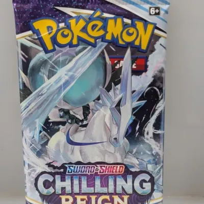 Sale Photo Thumbnail #528: Sealed Pokémon Sword & Shield: Chilling Reign trading card booster pack featuring Ice Rider Calyrex art.