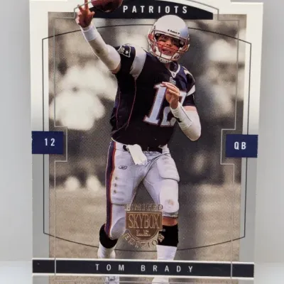 Sale Photo Thumbnail #606: SkyBox LE Edition Tom Brady New England Patriots football trading card in good condition.