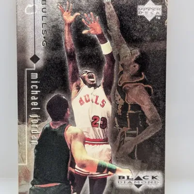 Sale Photo Thumbnail #108: 1996-97 Upper Deck Black Diamond Michael Jordan #1 basketball trading card, depicting Jordan in his Chicago Bulls uniform.