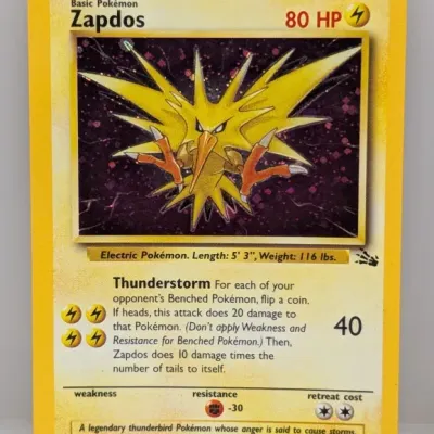 Sale Photo Thumbnail #242: 1999 Pokémon Fossil set Zapdos holographic trading card, numbered 15/62.