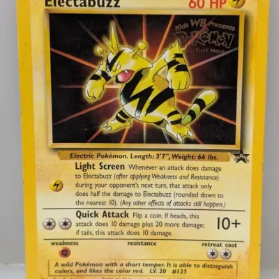 Sale Photo Thumbnail #426: Vintage 1999 Wizards of the Coast Pokémon Electabuzz #2 Black Star Promo card from Kids WB 'The First Movie'. Shows minor wear along the edges.