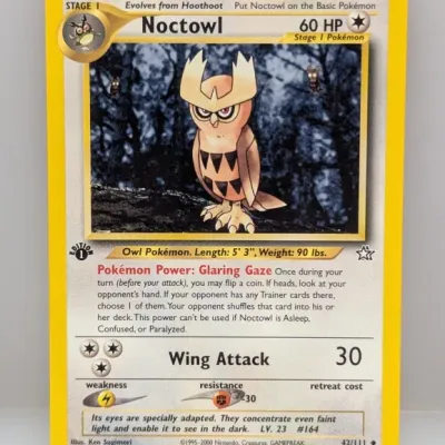 Sale Photo Thumbnail #813: 1st Edition Noctowl Pokémon trading card from the 2000 Neo Genesis set (42/111), illustrated by Ken Sugimori.