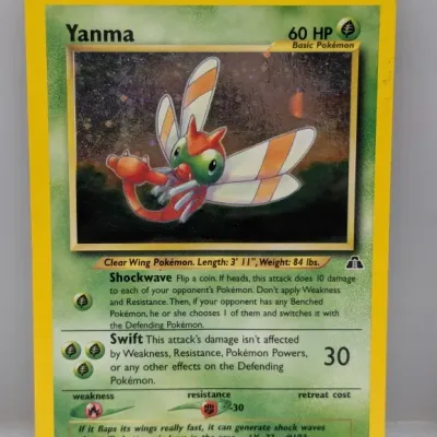Sale Photo Thumbnail #774: Holographic Yanma Pokémon trading card from the Neo Discovery set, released in 2001.