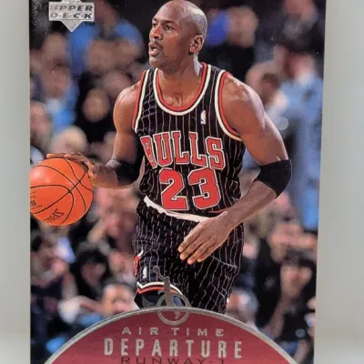 Sale Photo Thumbnail #848: Upper Deck Michael Jordan 'Air Time Departure Runway-1' basketball card featuring him in a black Chicago Bulls pinstripe uniform.
