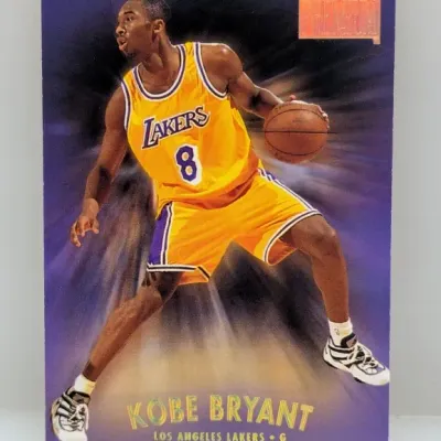 Sale Photo Thumbnail #517: 1996-97 Fleer Premium Kobe Bryant rookie basketball trading card featuring him in his gold Los Angeles Lakers jersey.