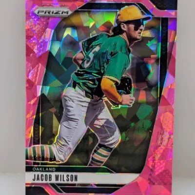 Sale Photo Thumbnail #676: Panini Prizm Jacob Wilson Oakland baseball trading card featuring a pink crackle refractor design.