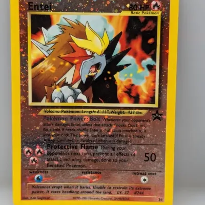 Sale Photo Thumbnail #861: Black Star Promo Entei holographic Pokémon trading card (#34), released circa 2001.