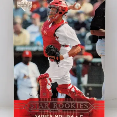 Sale Photo Thumbnail #446: 2004 Upper Deck Yadier Molina Star Rookies baseball card #224, featuring the St. Louis Cardinals catcher in red gear.