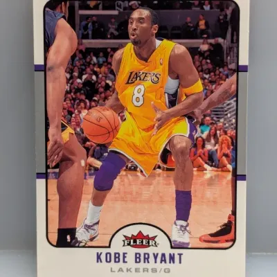 Sale Photo Thumbnail #577: Fleer Kobe Bryant Los Angeles Lakers basketball trading card in good condition.
