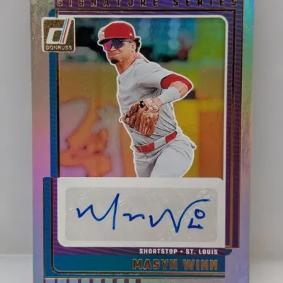 Sale Photo Thumbnail #352: Panini Donruss Signature Series Masyn Winn autographed baseball card with a holographic finish.