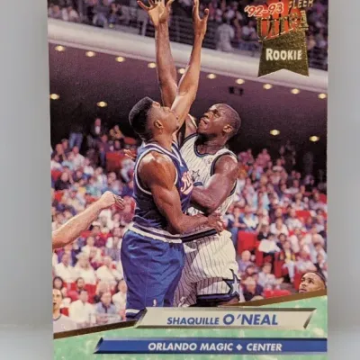Sale Photo Thumbnail #92: 1992-93 Fleer Ultra Shaquille O'Neal rookie basketball card #328 in raw, ungraded condition.