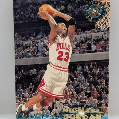 Sale Photo Thumbnail #612: 1997-98 Topps Stadium Club Michael Jordan basketball trading card #101, featuring gold foil lettering and Stadium Club logo branding.